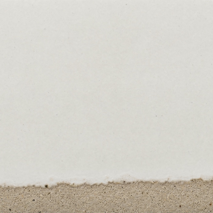 C1 · chalk slip on raw stoneware (dip boundary visible)