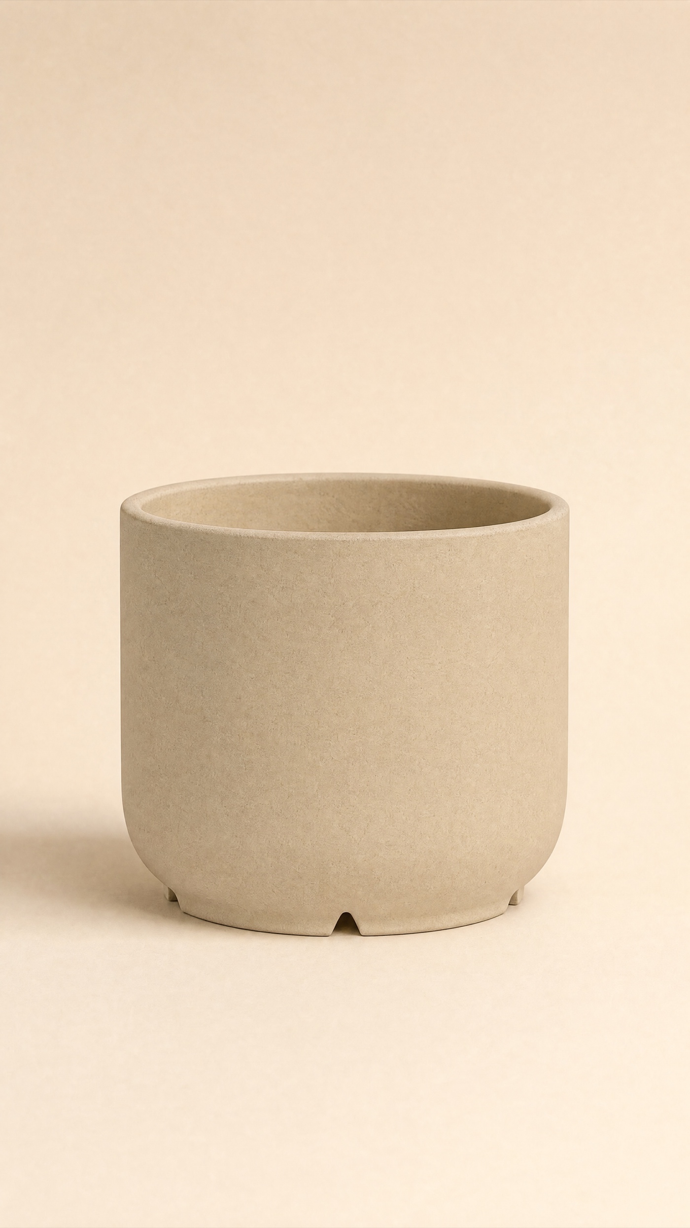 Vent-Foot Cachepot — the full studio frame.