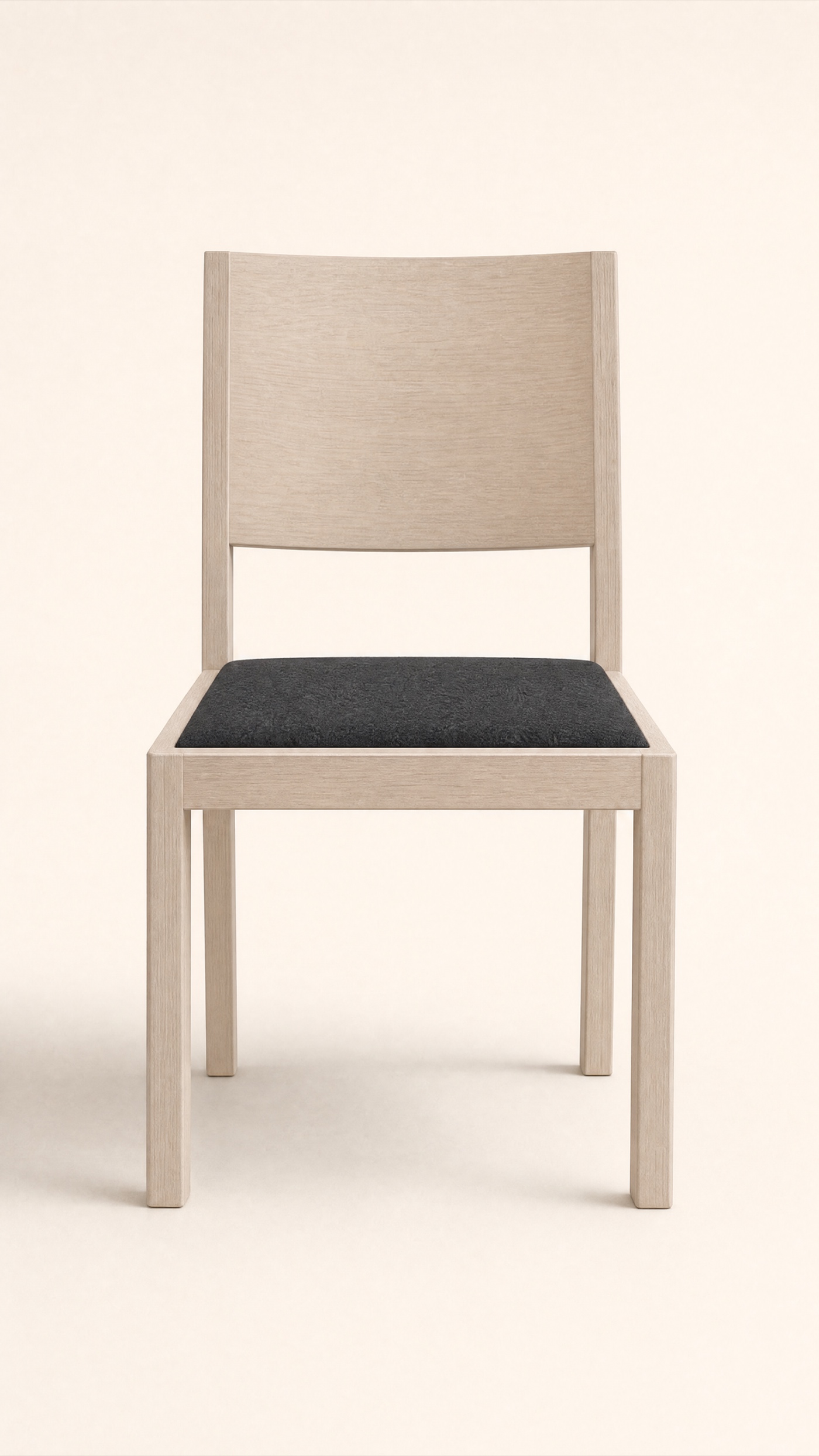 Felt Games Chair — the full studio frame.